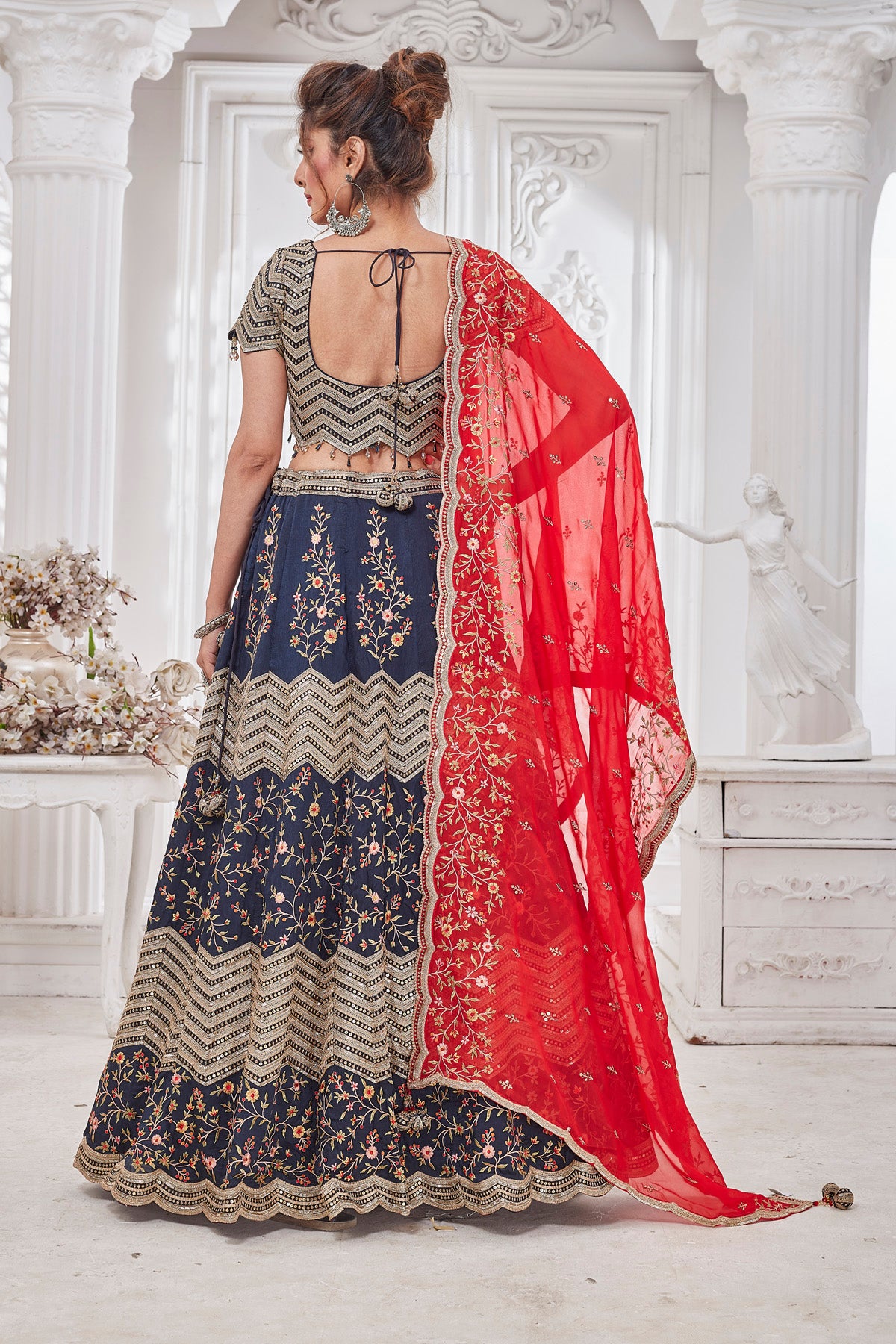 Shop gorgeous blue embroidered designer lehenga online in USA with red dupatta. Get set for weddings and festive occasions in exclusive designer Anarkali suits, wedding gown, salwar suits, gharara suits, Indowestern dresses from Pure Elegance Indian fashion store in USA.-back