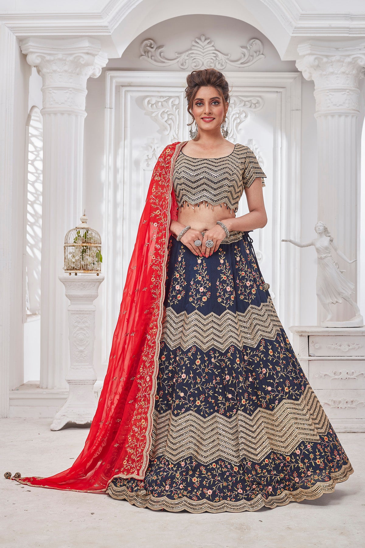 Shop gorgeous blue embroidered designer lehenga online in USA with red dupatta. Get set for weddings and festive occasions in exclusive designer Anarkali suits, wedding gown, salwar suits, gharara suits, Indowestern dresses from Pure Elegance Indian fashion store in USA.-full view