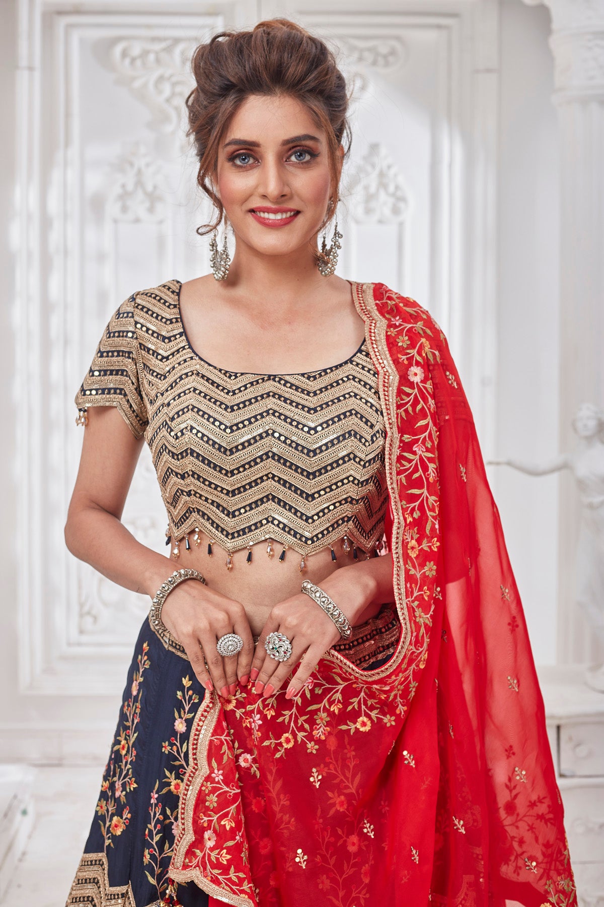 Shop gorgeous blue embroidered designer lehenga online in USA with red dupatta. Get set for weddings and festive occasions in exclusive designer Anarkali suits, wedding gown, salwar suits, gharara suits, Indowestern dresses from Pure Elegance Indian fashion store in USA.-closeup