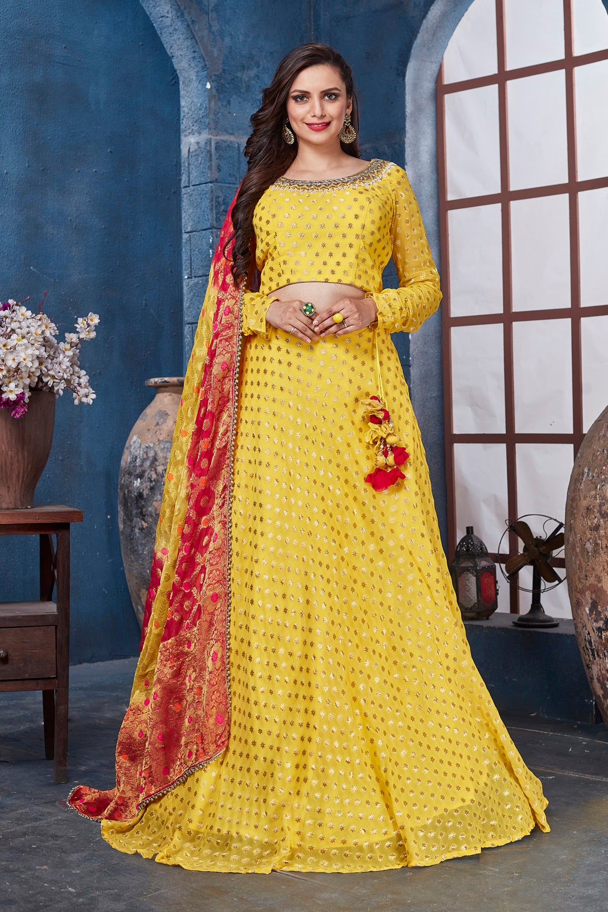 Buy stunning yellow designer lehenga online in USA with red dupatta. Get set for weddings and festive occasions in exclusive designer Anarkali suits, wedding gown, salwar suits, gharara suits, Indowestern dresses from Pure Elegance Indian fashion store in USA.-full view