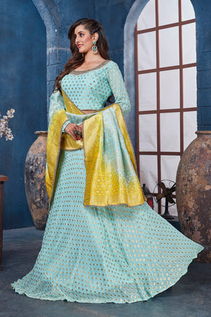 Buy gorgeous light blue embroidered designer lehenga online in USA with yellow dupatta. Get set for weddings and festive occasions in exclusive designer Anarkali suits, wedding gown, salwar suits, gharara suits, Indowestern dresses from Pure Elegance Indian fashion store in USA.-side