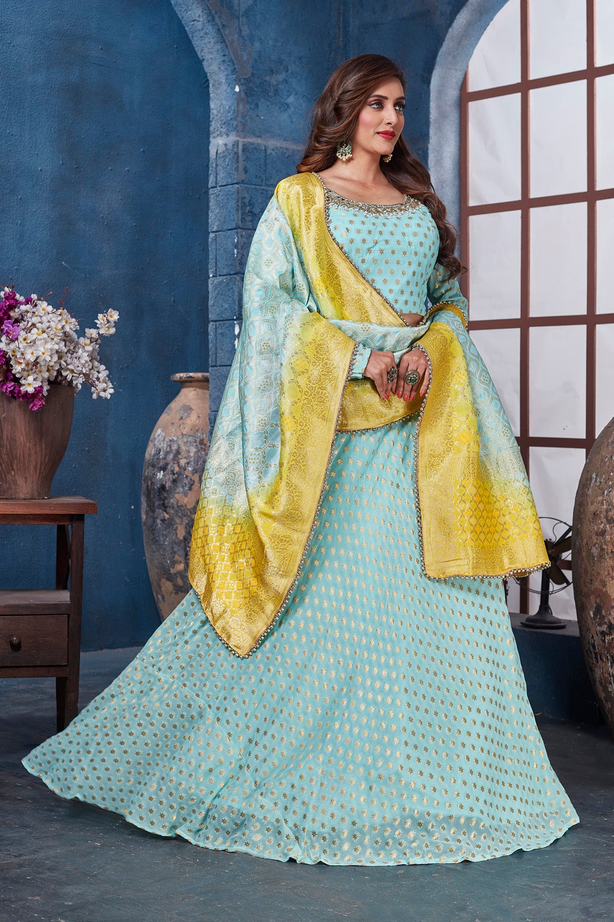 Buy gorgeous light blue embroidered designer lehenga online in USA with yellow dupatta. Get set for weddings and festive occasions in exclusive designer Anarkali suits, wedding gown, salwar suits, gharara suits, Indowestern dresses from Pure Elegance Indian fashion store in USA.-right