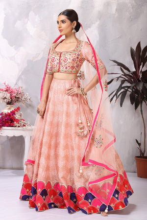 Buy stunning light pink embroidered designer lehenga online in USA. Be the center of attraction on special occasion in beautiful designer lehengas, bridal lehengas, palazzo suits, sharara suits, Anarkali suits, gowns from Pure Elegance Indian fashion store in USA.-side