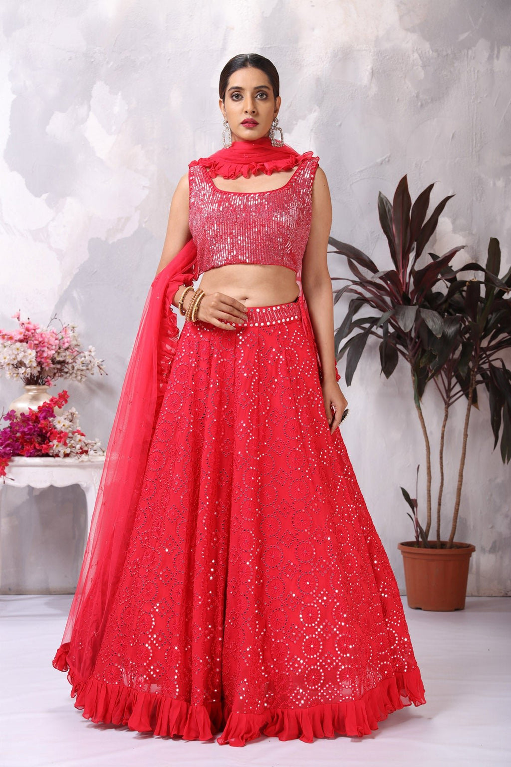 Shop stunning pink mirror work lehenga online in USA with ruffle dupatta. Be the center of attraction on special occasion in beautiful designer lehengas, bridal lehengas, palazzo suits, sharara suits, Anarkali suits, gowns from Pure Elegance Indian fashion store in USA.-full view