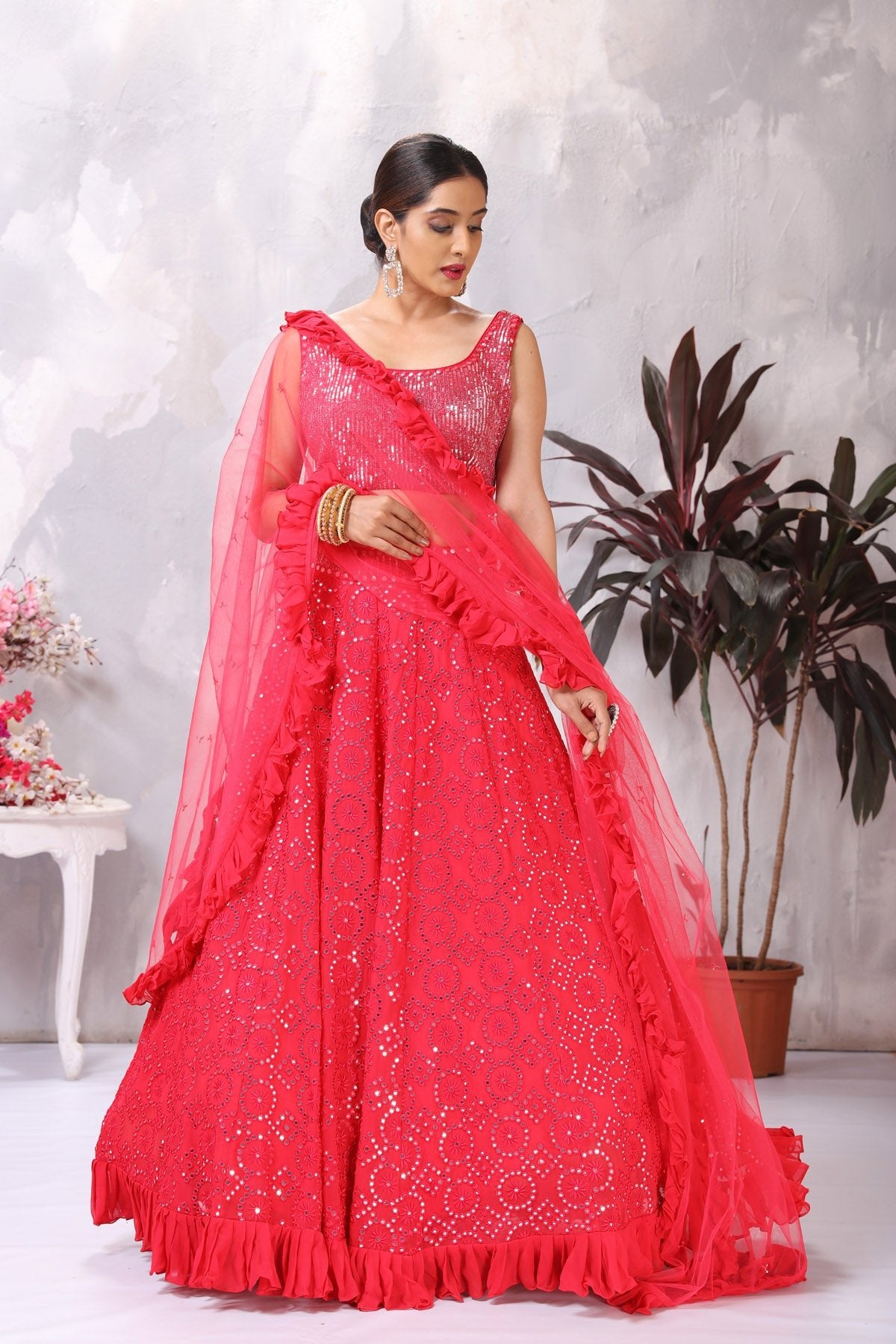 Shop stunning pink mirror work lehenga online in USA with ruffle dupatta. Be the center of attraction on special occasion in beautiful designer lehengas, bridal lehengas, palazzo suits, sharara suits, Anarkali suits, gowns from Pure Elegance Indian fashion store in USA.-front