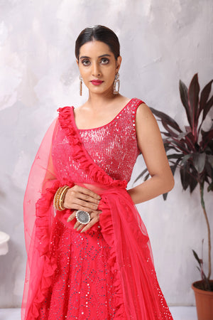 Shop stunning pink mirror work lehenga online in USA with ruffle dupatta. Be the center of attraction on special occasion in beautiful designer lehengas, bridal lehengas, palazzo suits, sharara suits, Anarkali suits, gowns from Pure Elegance Indian fashion store in USA.-closeup