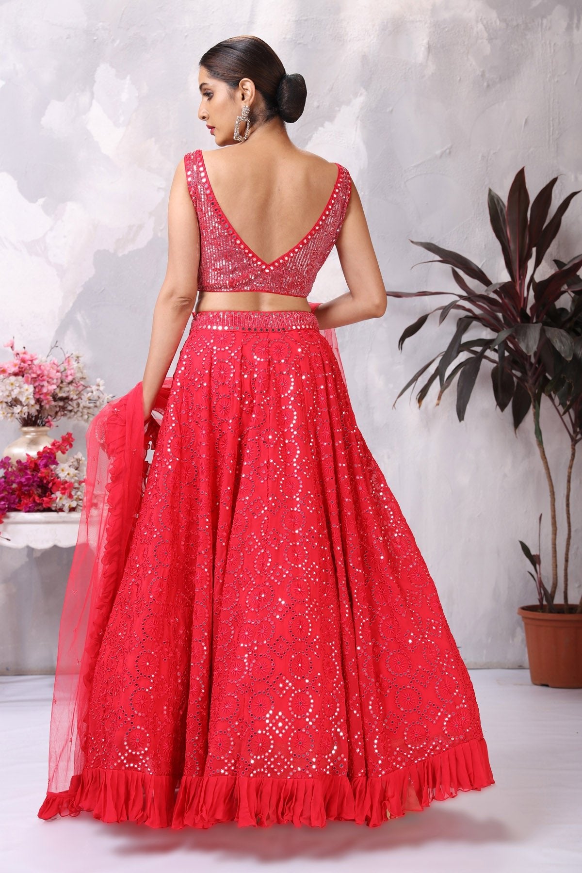 Shop stunning pink mirror work lehenga online in USA with ruffle dupatta. Be the center of attraction on special occasion in beautiful designer lehengas, bridal lehengas, palazzo suits, sharara suits, Anarkali suits, gowns from Pure Elegance Indian fashion store in USA.-back