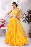 Buy stunning yellow embroidered designer lehenga online in USA with dupatta. Be the center of attraction on special occasion in beautiful designer lehengas, bridal lehengas, palazzo suits, sharara suits, Anarkali suits, gowns from Pure Elegance Indian fashion store in USA.-full view