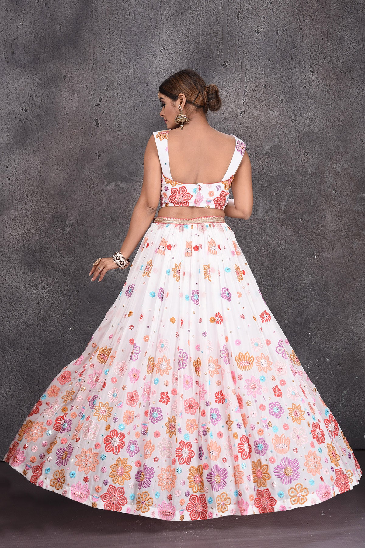 Buy stunning white floral embroidered designer lehenga online in USA with dupatta. Radiate ethnic glam on special occasions in beautiful designer lehengas, Anarkali suits, Indowestern dresses, designer gown, salwar suits from Pure Elegance Indian fashion store in USA,-back