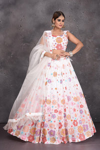 Buy stunning white floral embroidered designer lehenga online in USA with dupatta. Radiate ethnic glam on special occasions in beautiful designer lehengas, Anarkali suits, Indowestern dresses, designer gown, salwar suits from Pure Elegance Indian fashion store in USA,-full view