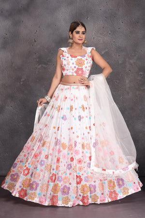Buy stunning white floral embroidered designer lehenga online in USA with dupatta. Radiate ethnic glam on special occasions in beautiful designer lehengas, Anarkali suits, Indowestern dresses, designer gown, salwar suits from Pure Elegance Indian fashion store in USA,-front