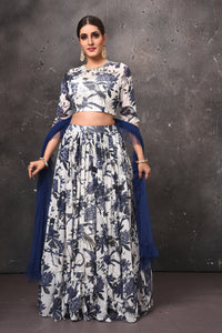 Buy beautiful white and blue printed lehenga online in USA with blue dupatta. Get set for weddings and festive occasions in exclusive designer Anarkali suits, wedding gown, salwar suits, gharara suits, Indowestern dresses from Pure Elegance Indian fashion store in USA.-full view