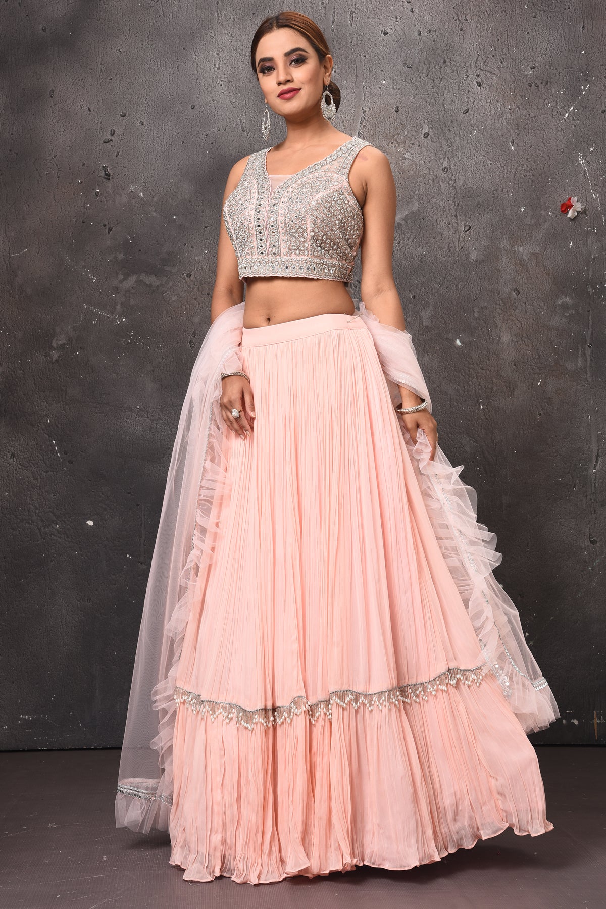 Buy stunning powder pink mirror work designer lehenga online in USA with dupatta. Get set for weddings and festive occasions in exclusive designer Anarkali suits, wedding gown, salwar suits, gharara suits, Indowestern dresses from Pure Elegance Indian fashion store in USA.-left