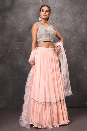 Buy stunning powder pink mirror work designer lehenga online in USA with dupatta. Get set for weddings and festive occasions in exclusive designer Anarkali suits, wedding gown, salwar suits, gharara suits, Indowestern dresses from Pure Elegance Indian fashion store in USA.-side