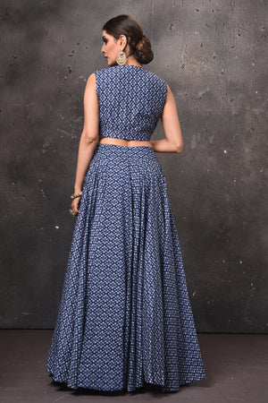 Shop stunning blue printed lehenga online in USA with embellished belt. Get set for weddings and festive occasions in exclusive designer Anarkali suits, wedding gown, salwar suits, gharara suits, Indowestern dresses from Pure Elegance Indian fashion store in USA.-back