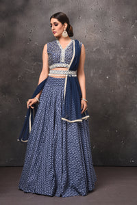 Shop stunning blue printed lehenga online in USA with embellished belt. Get set for weddings and festive occasions in exclusive designer Anarkali suits, wedding gown, salwar suits, gharara suits, Indowestern dresses from Pure Elegance Indian fashion store in USA.-full view