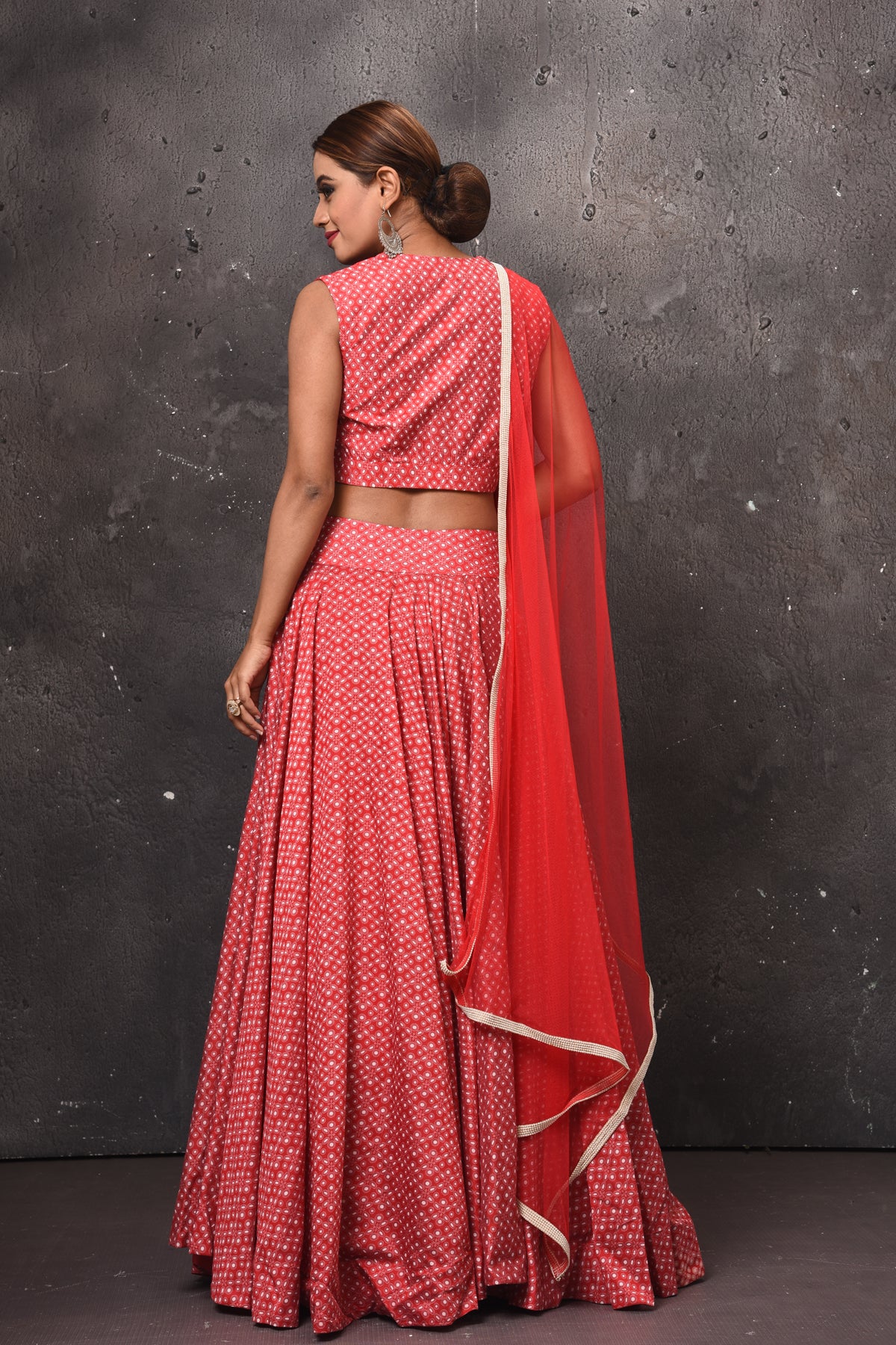 Buy stunning red printed lehenga online in USA with embellished belt. Get set for weddings and festive occasions in exclusive designer Anarkali suits, wedding gown, salwar suits, gharara suits, Indowestern dresses from Pure Elegance Indian fashion store in USA.-back