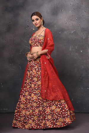 Shop stunning printed lehenga online in USA with cape jacket. Get set for weddings and festive occasions in exclusive designer Anarkali suits, wedding gown, salwar suits, gharara suits, Indowestern dresses from Pure Elegance Indian fashion store in USA.-side