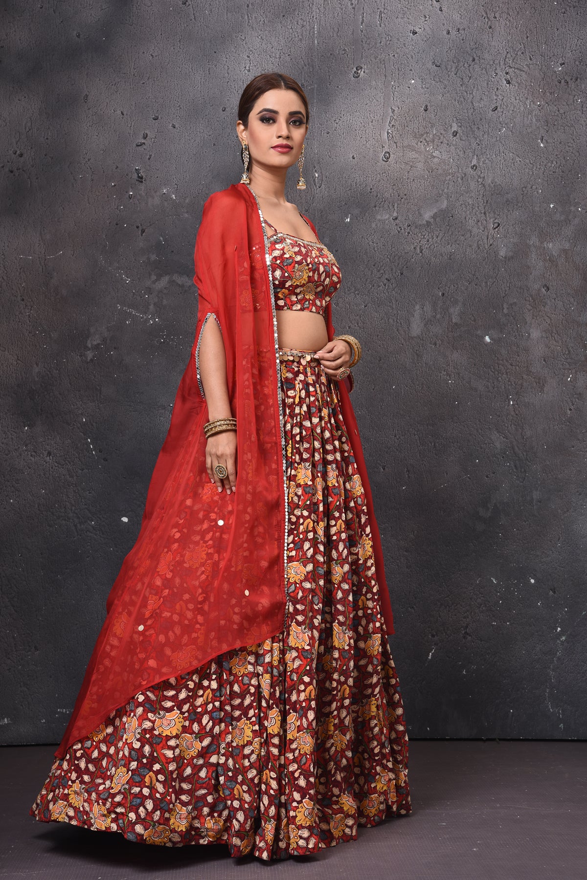 Shop stunning printed lehenga online in USA with cape jacket. Get set for weddings and festive occasions in exclusive designer Anarkali suits, wedding gown, salwar suits, gharara suits, Indowestern dresses from Pure Elegance Indian fashion store in USA.-cape