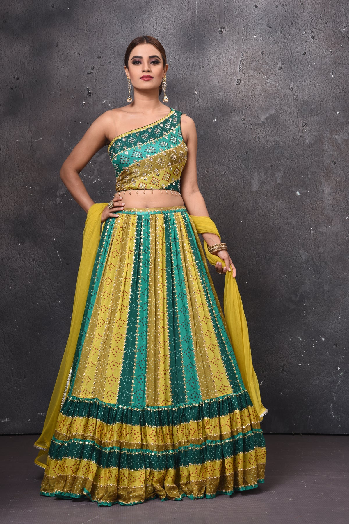 Buy beautiful green shaded stripes lehenga online in USA with dupatta. Get set for weddings and festive occasions in exclusive designer Anarkali suits, wedding gown, salwar suits, gharara suits, Indowestern dresses from Pure Elegance Indian fashion store in USA.-front
