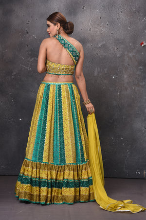 Buy beautiful green shaded stripes lehenga online in USA with dupatta. Get set for weddings and festive occasions in exclusive designer Anarkali suits, wedding gown, salwar suits, gharara suits, Indowestern dresses from Pure Elegance Indian fashion store in USA.-closeup