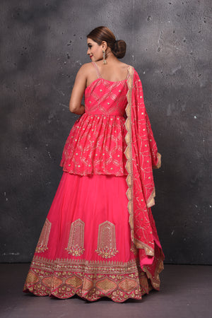Shop beautiful pink embroidered peplum lehenga online in USA with dupatta. Get set for weddings and festive occasions in exclusive designer Anarkali suits, wedding gown, salwar suits, gharara suits, Indowestern dresses from Pure Elegance Indian fashion store in USA.-back