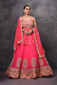 Shop beautiful pink embroidered peplum lehenga online in USA with dupatta. Get set for weddings and festive occasions in exclusive designer Anarkali suits, wedding gown, salwar suits, gharara suits, Indowestern dresses from Pure Elegance Indian fashion store in USA.-full view