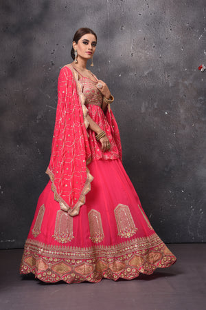Shop beautiful pink embroidered peplum lehenga online in USA with dupatta. Get set for weddings and festive occasions in exclusive designer Anarkali suits, wedding gown, salwar suits, gharara suits, Indowestern dresses from Pure Elegance Indian fashion store in USA.-right