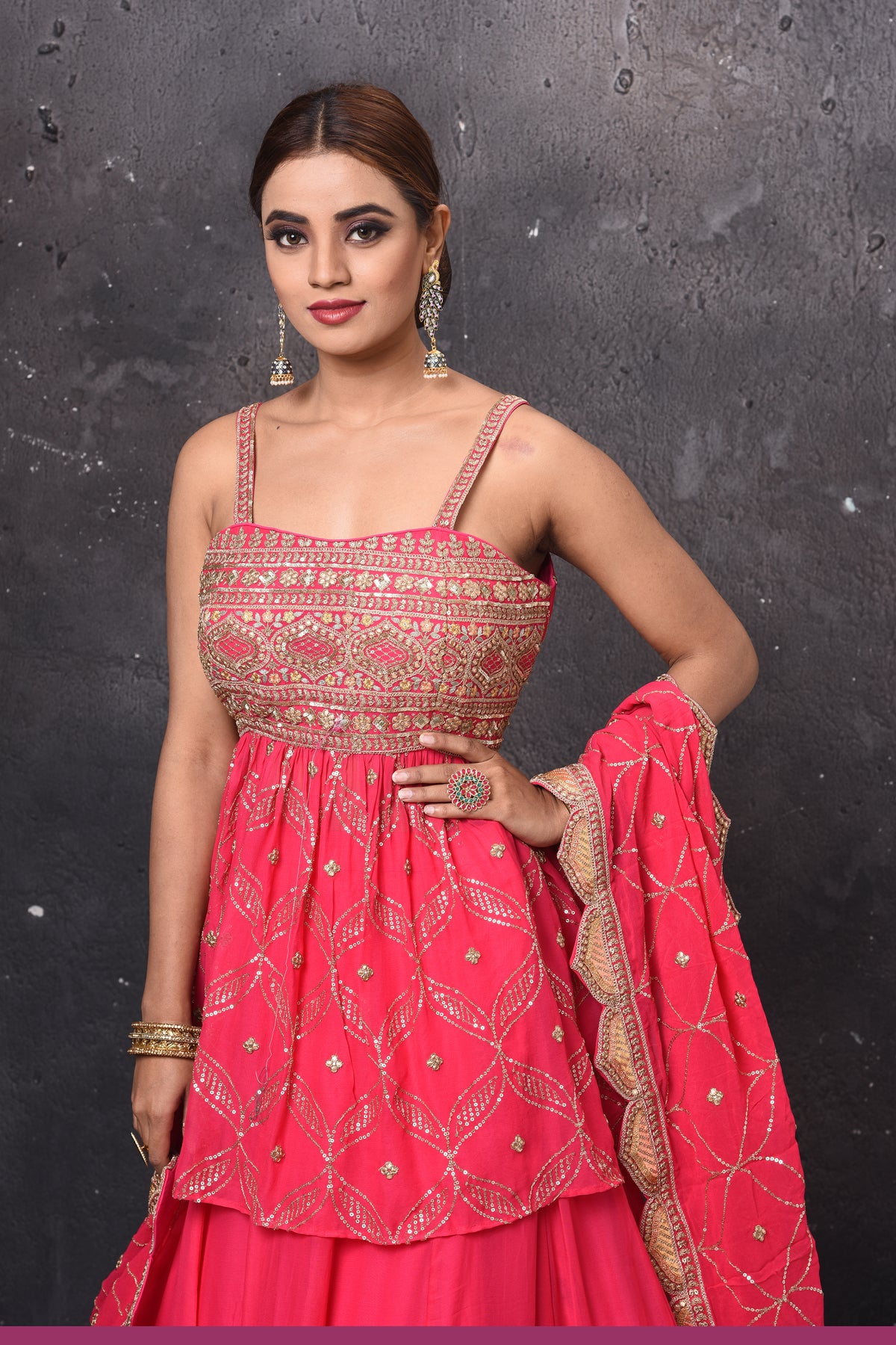 Shop beautiful pink embroidered peplum lehenga online in USA with dupatta. Get set for weddings and festive occasions in exclusive designer Anarkali suits, wedding gown, salwar suits, gharara suits, Indowestern dresses from Pure Elegance Indian fashion store in USA.-closeup