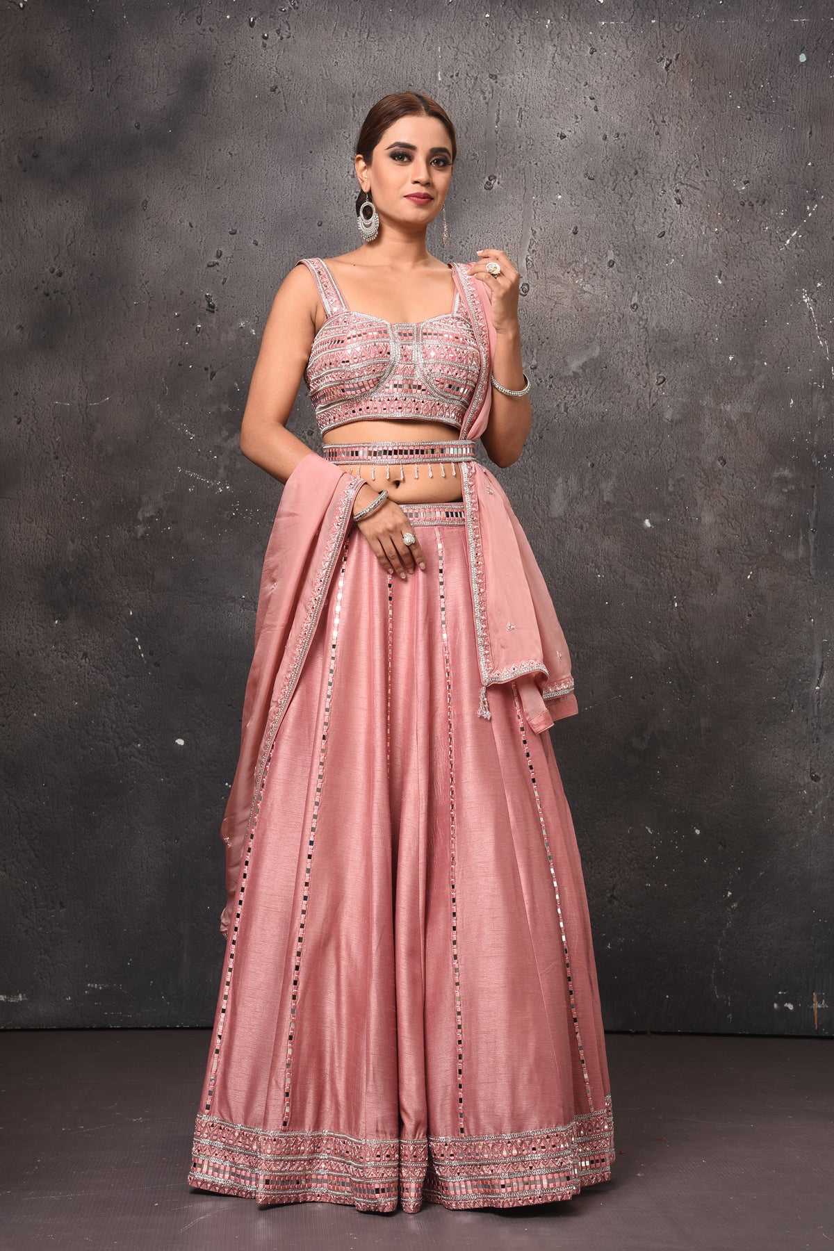 Shop stunning dusty pink mirror work belted lehenga online in USA with dupatta. Get set for weddings and festive occasions in exclusive designer Anarkali suits, wedding gown, salwar suits, gharara suits, Indowestern dresses from Pure Elegance Indian fashion store in USA.-front