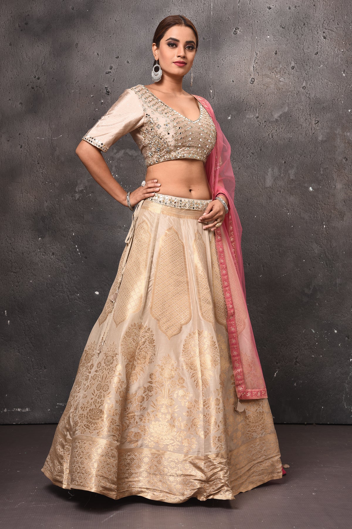 Buy stunning golden embroidered designer lehenga online in USA with pink dupatta. Get set for weddings and festive occasions in exclusive designer Anarkali suits, wedding gown, salwar suits, gharara suits, Indowestern dresses from Pure Elegance Indian fashion store in USA.-right