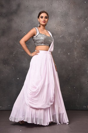 Shop stunning powder pink designer lehenga online in USA with dupatta. Get set for weddings and festive occasions in exclusive designer Anarkali suits, wedding gown, salwar suits, gharara suits, Indowestern dresses from Pure Elegance Indian fashion store in USA.-right