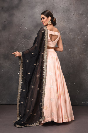 Buy beautiful peach designer lehenga online in USA with black embroidered dupatta. Get set for weddings and festive occasions in exclusive designer Anarkali suits, wedding gown, salwar suits, gharara suits, Indowestern dresses from Pure Elegance Indian fashion store in USA.-back