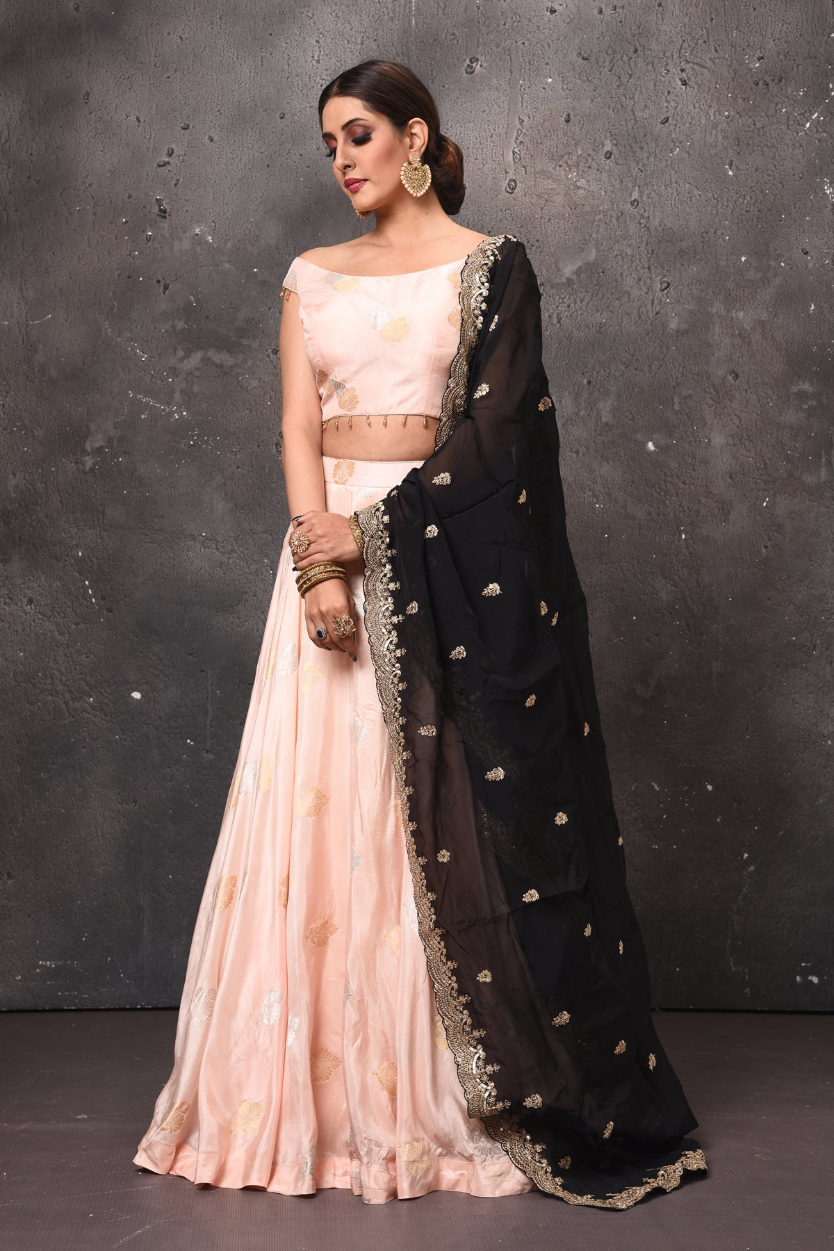 Buy beautiful peach designer lehenga online in USA with black embroidered dupatta. Get set for weddings and festive occasions in exclusive designer Anarkali suits, wedding gown, salwar suits, gharara suits, Indowestern dresses from Pure Elegance Indian fashion store in USA.-dupatta