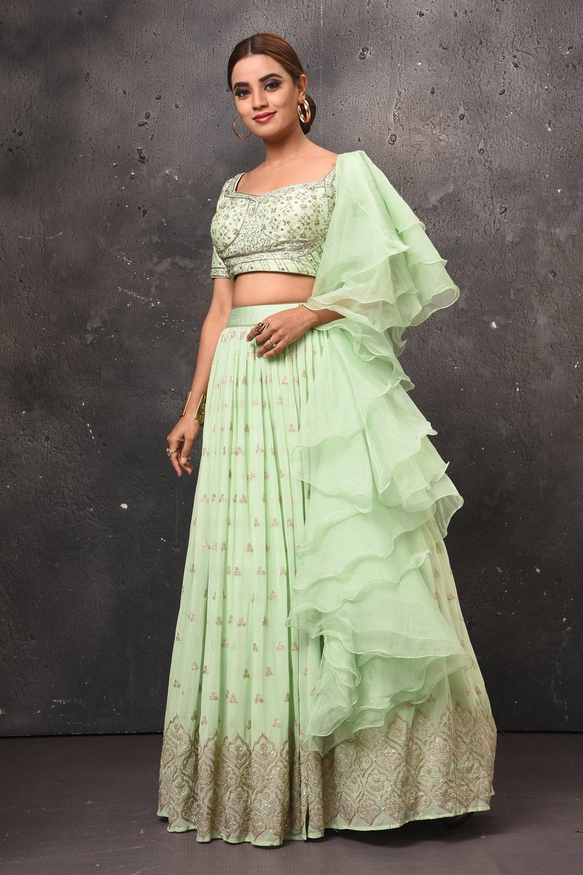 Buy stunning mint green embroidered lehenga online in USA with ruffle dupatta. Get set for weddings and festive occasions in exclusive designer Anarkali suits, wedding gown, salwar suits, gharara suits, Indowestern dresses from Pure Elegance Indian fashion store in USA.-dupatta
