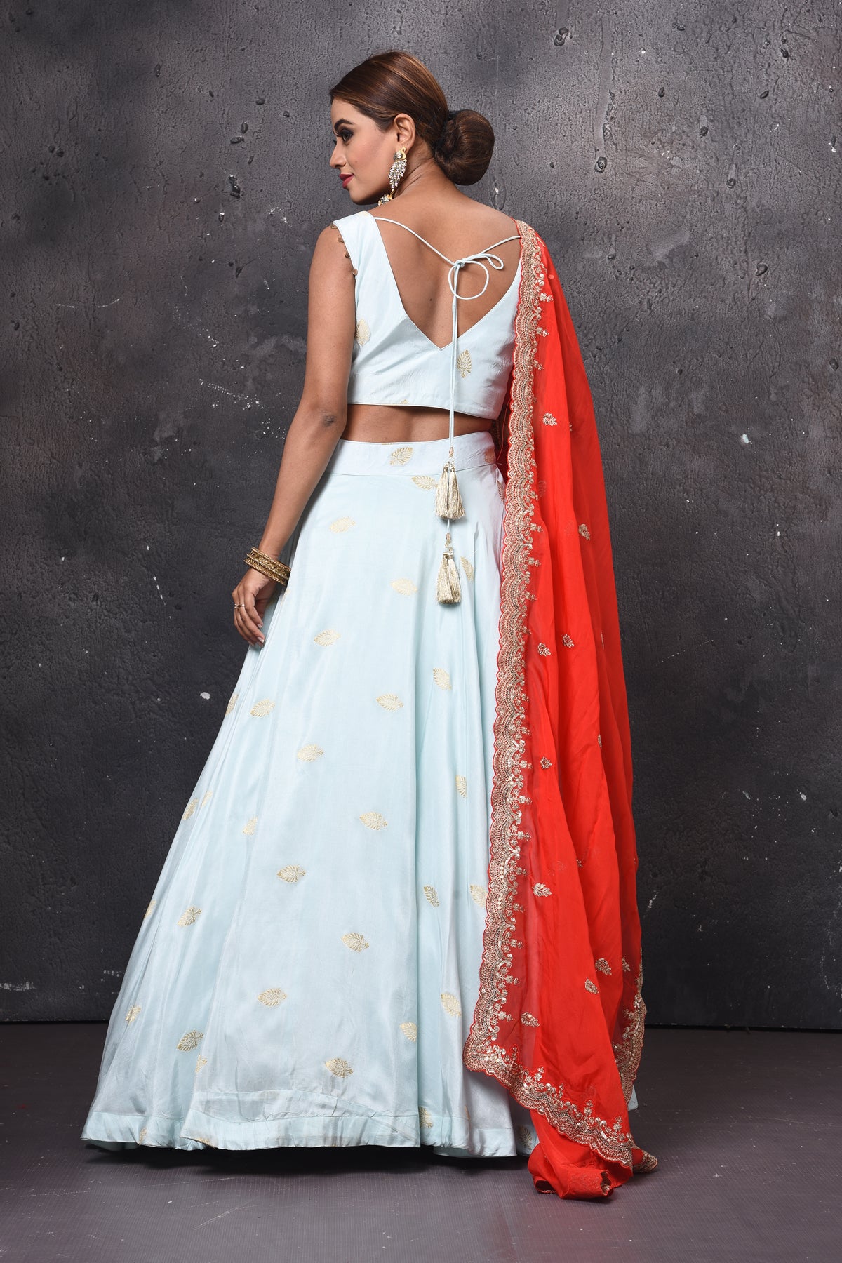Buy stunning powder blue designer lehenga online in USA with red embroidered dupatta. Get set for weddings and festive occasions in exclusive designer Anarkali suits, wedding gown, salwar suits, gharara suits, Indowestern dresses from Pure Elegance Indian fashion store in USA.-back