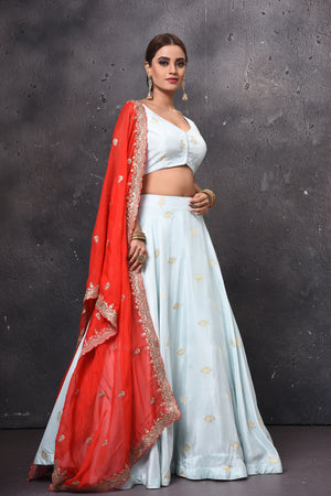 Buy stunning powder blue designer lehenga online in USA with red embroidered dupatta. Get set for weddings and festive occasions in exclusive designer Anarkali suits, wedding gown, salwar suits, gharara suits, Indowestern dresses from Pure Elegance Indian fashion store in USA.-side