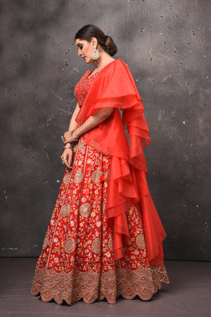 Buy beautiful red embroidered designer lehenga online in USA with fancy dupatta. Get set for weddings and festive occasions in exclusive designer Anarkali suits, wedding gown, salwar suits, gharara suits, Indowestern dresses from Pure Elegance Indian fashion store in USA.-side
