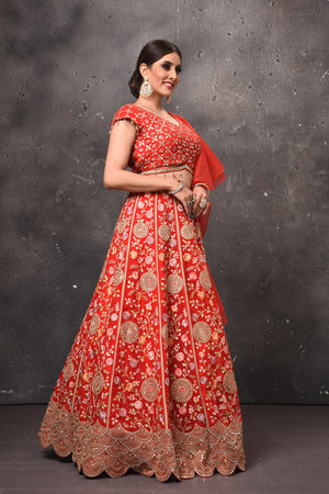 Buy beautiful red embroidered designer lehenga online in USA with fancy dupatta. Get set for weddings and festive occasions in exclusive designer Anarkali suits, wedding gown, salwar suits, gharara suits, Indowestern dresses from Pure Elegance Indian fashion store in USA.-right
