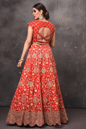 Buy beautiful red embroidered designer lehenga online in USA with fancy dupatta. Get set for weddings and festive occasions in exclusive designer Anarkali suits, wedding gown, salwar suits, gharara suits, Indowestern dresses from Pure Elegance Indian fashion store in USA.-back