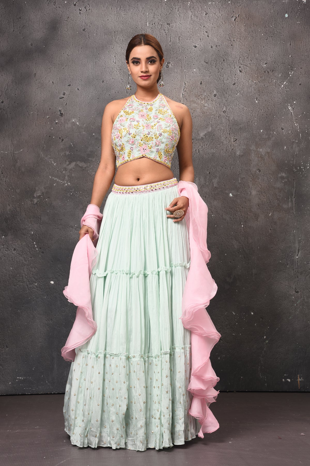 Shop beautiful mint green contemporary lehenga online in USA with pink ruffle dupatta. Get set for weddings and festive occasions in exclusive designer Anarkali suits, wedding gown, salwar suits, gharara suits, Indowestern dresses from Pure Elegance Indian fashion store in USA.-full view
