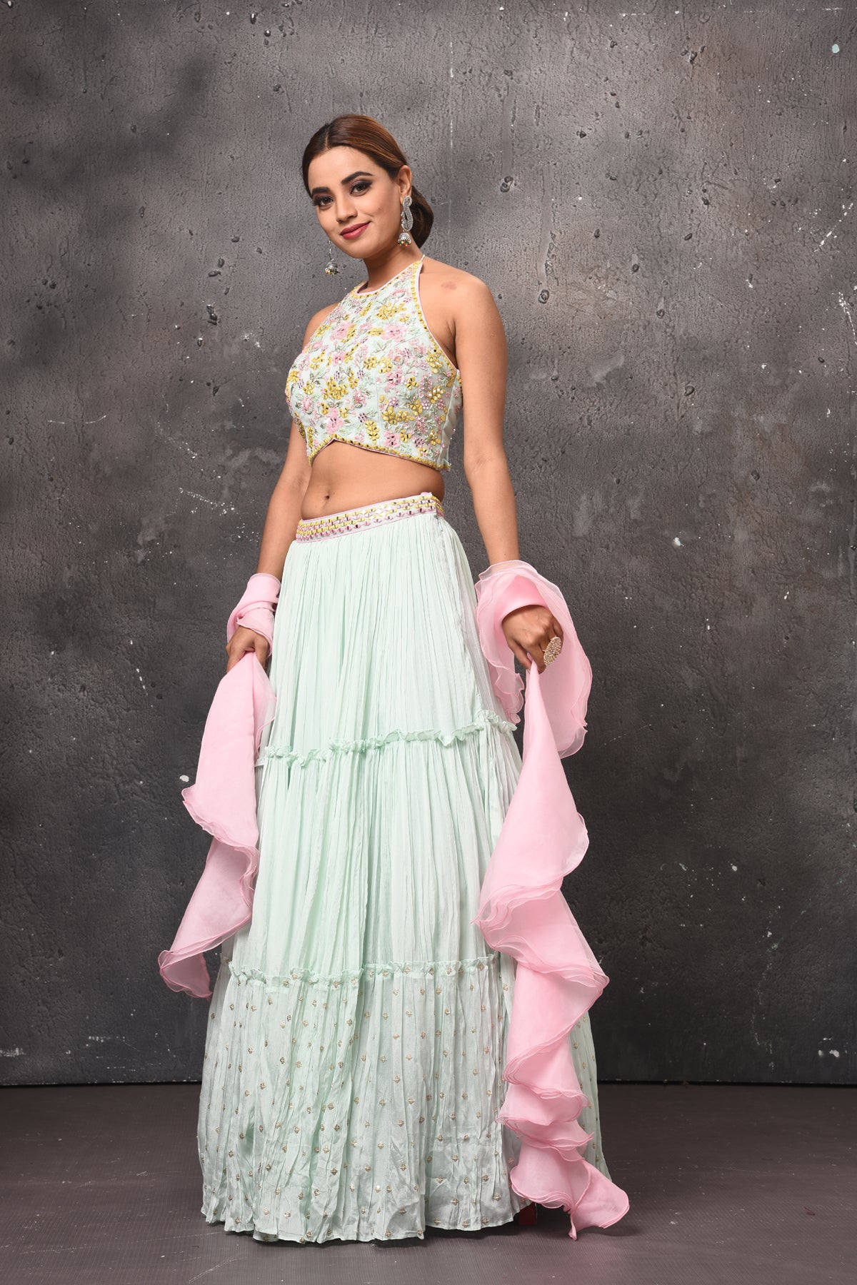 Shop beautiful mint green contemporary lehenga online in USA with pink ruffle dupatta. Get set for weddings and festive occasions in exclusive designer Anarkali suits, wedding gown, salwar suits, gharara suits, Indowestern dresses from Pure Elegance Indian fashion store in USA.-side