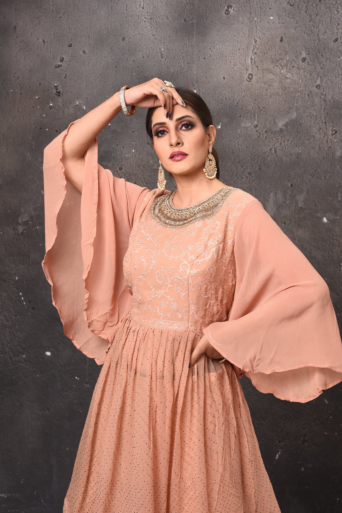 Buy beautiful beige embroidered peplum skirt set online in USA with dupatta. Get set for weddings and festive occasions in exclusive designer Anarkali suits, wedding gown, salwar suits, gharara suits, Indowestern dresses from Pure Elegance Indian fashion store in USA.-closeup