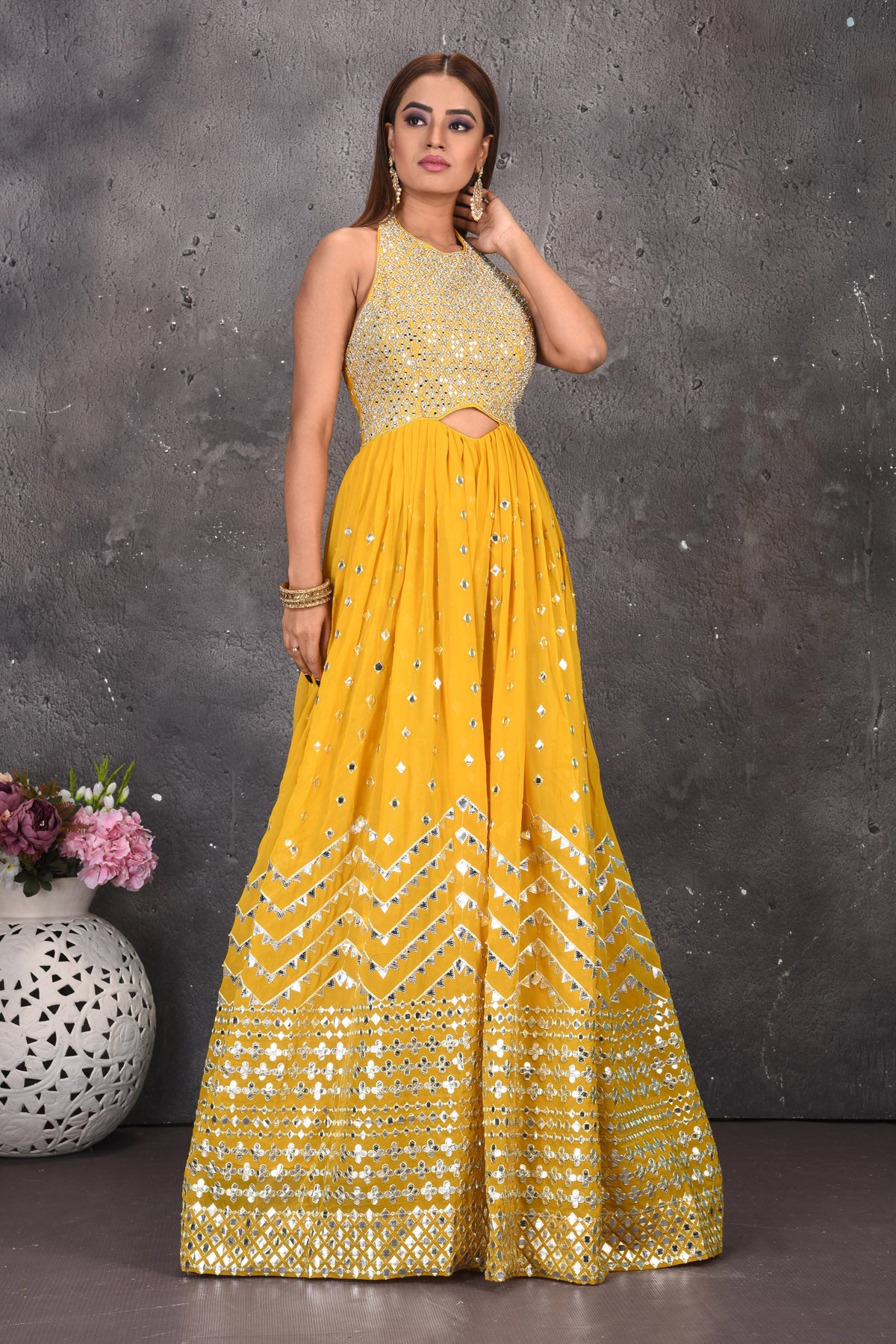 Shop beautiful yellow halter neck mirror embroidery jumpsuit online in USA. Look stylish at parties and wedding festivities in designer dresses, Indowestern outfits, Anarkali suits, wedding lehengas, palazzo suits, sharara suits from Pure Elegance Indian clothing store in USA.-side