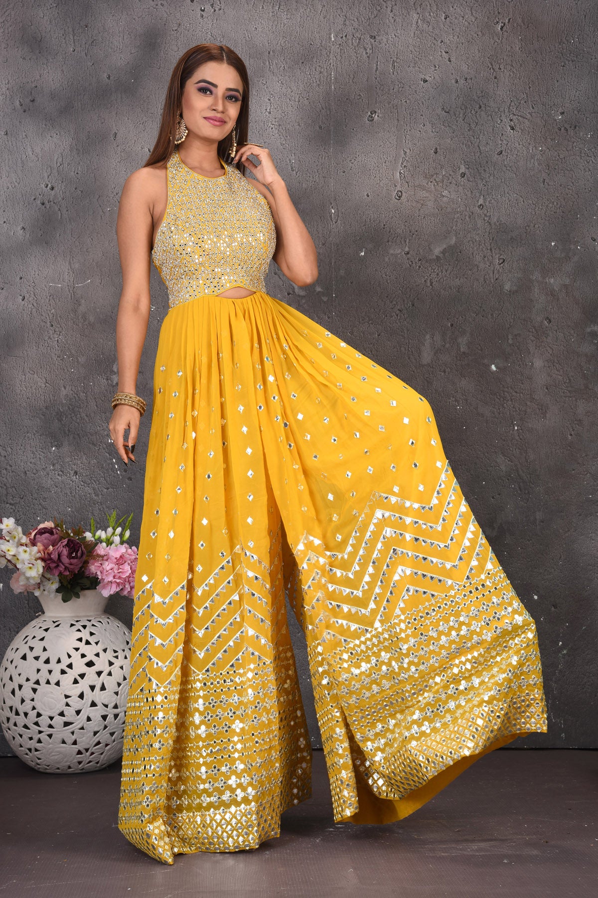 Shop beautiful yellow halter neck mirror embroidery jumpsuit online in USA. Look stylish at parties and wedding festivities in designer dresses, Indowestern outfits, Anarkali suits, wedding lehengas, palazzo suits, sharara suits from Pure Elegance Indian clothing store in USA.-jumpsuit