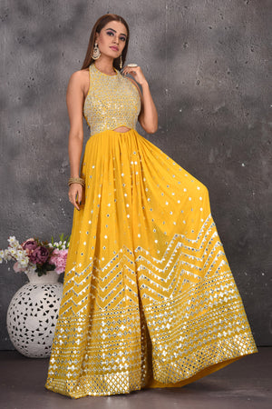 Buy stunning yellow halter neck mirror work jumpsuit online in USA. Look stylish at parties and wedding festivities in designer dresses, Indowestern outfits, Anarkali suits, wedding lehengas, palazzo suits, sharara suits from Pure Elegance Indian clothing store in USA.-flare