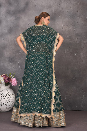 Buy stunning green embroidered skirt set online in USA with kaftaan blouse. Look stylish at parties and wedding festivities in designer dresses, Indowestern outfits, Anarkali suits, wedding lehengas, palazzo suits, sharara suits from Pure Elegance Indian clothing store in USA.-back