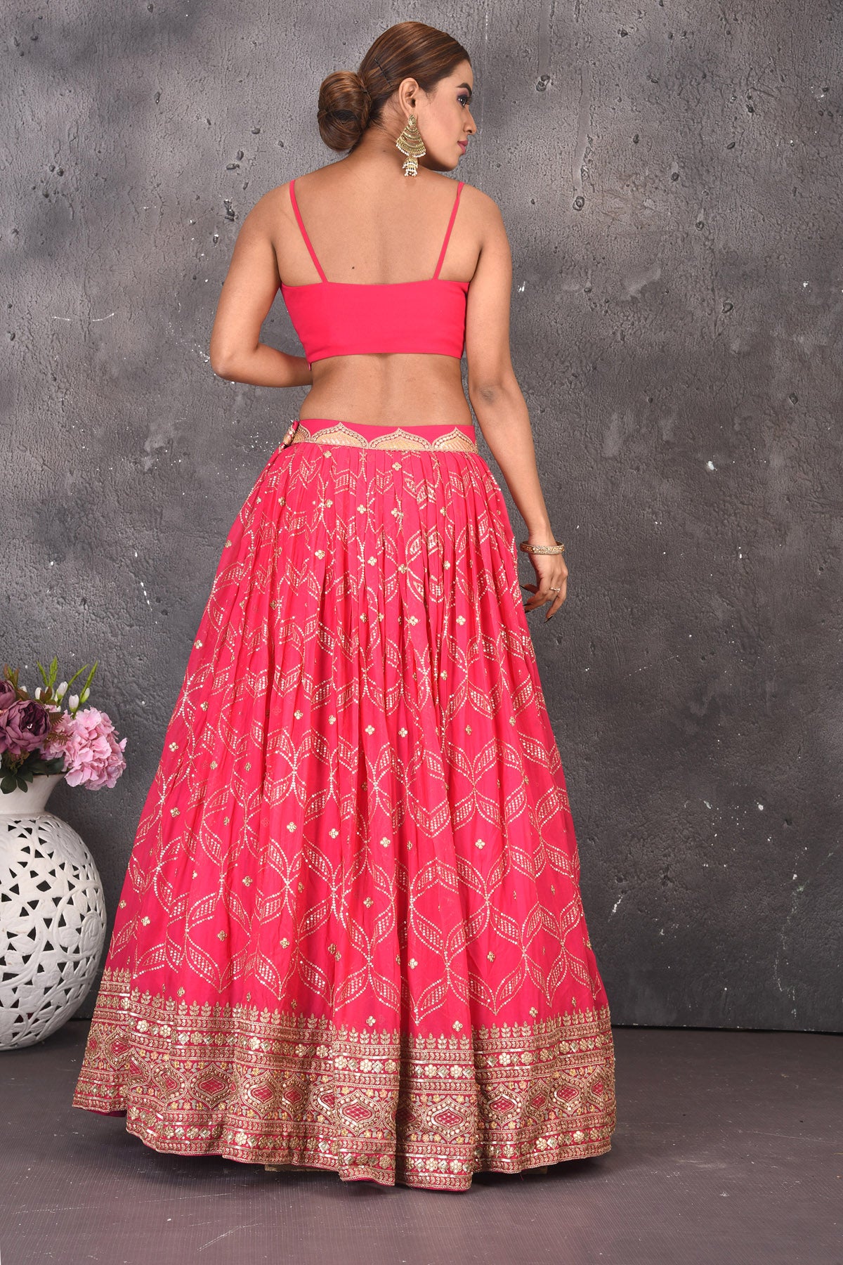 Buy gorgeous pink embroidered skirt set online in USA with kaftaan overlay. Look stylish at parties and wedding festivities in designer dresses, Indowestern outfits, Anarkali suits, wedding lehengas, palazzo suits, sharara suits from Pure Elegance Indian clothing store in USA.-back
