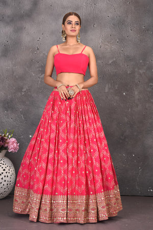 Buy gorgeous pink embroidered skirt set online in USA with kaftaan overlay. Look stylish at parties and wedding festivities in designer dresses, Indowestern outfits, Anarkali suits, wedding lehengas, palazzo suits, sharara suits from Pure Elegance Indian clothing store in USA.-front