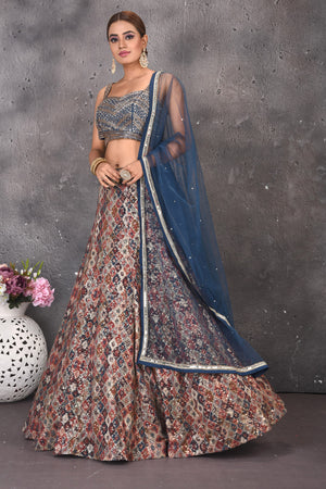Buy beautiful blue multicolor embroidered designer lehenga online in USA with dupatta. Look stylish at parties and wedding festivities in designer dresses, Indowestern outfits, Anarkali suits, wedding lehengas, palazzo suits, sharara suits from Pure Elegance Indian clothing store in USA.-side
